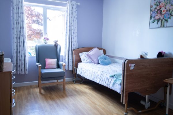 Contemporary bedroom with neutral tones and modern furnishings